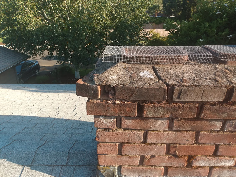 Chimney with loose brick Photo of a chimney with loose brick.