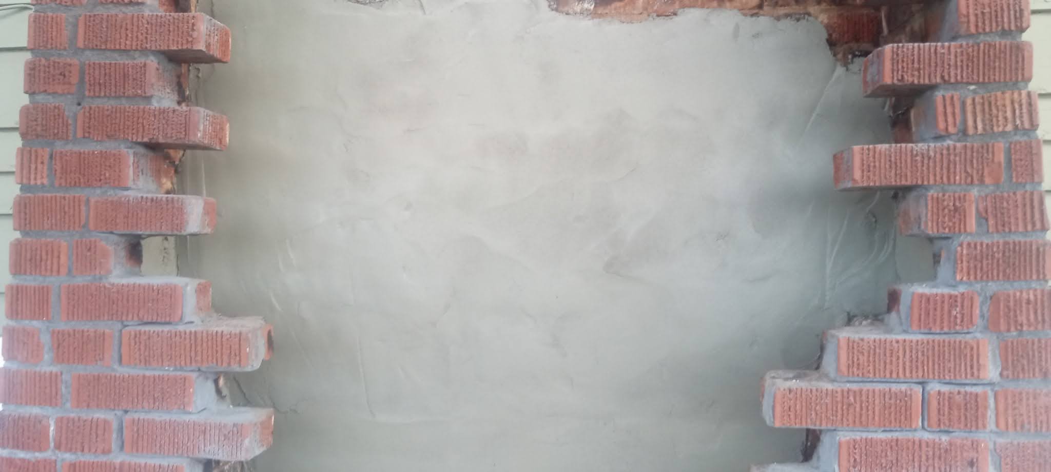 Face of a chimney dismantled for rebuilding.