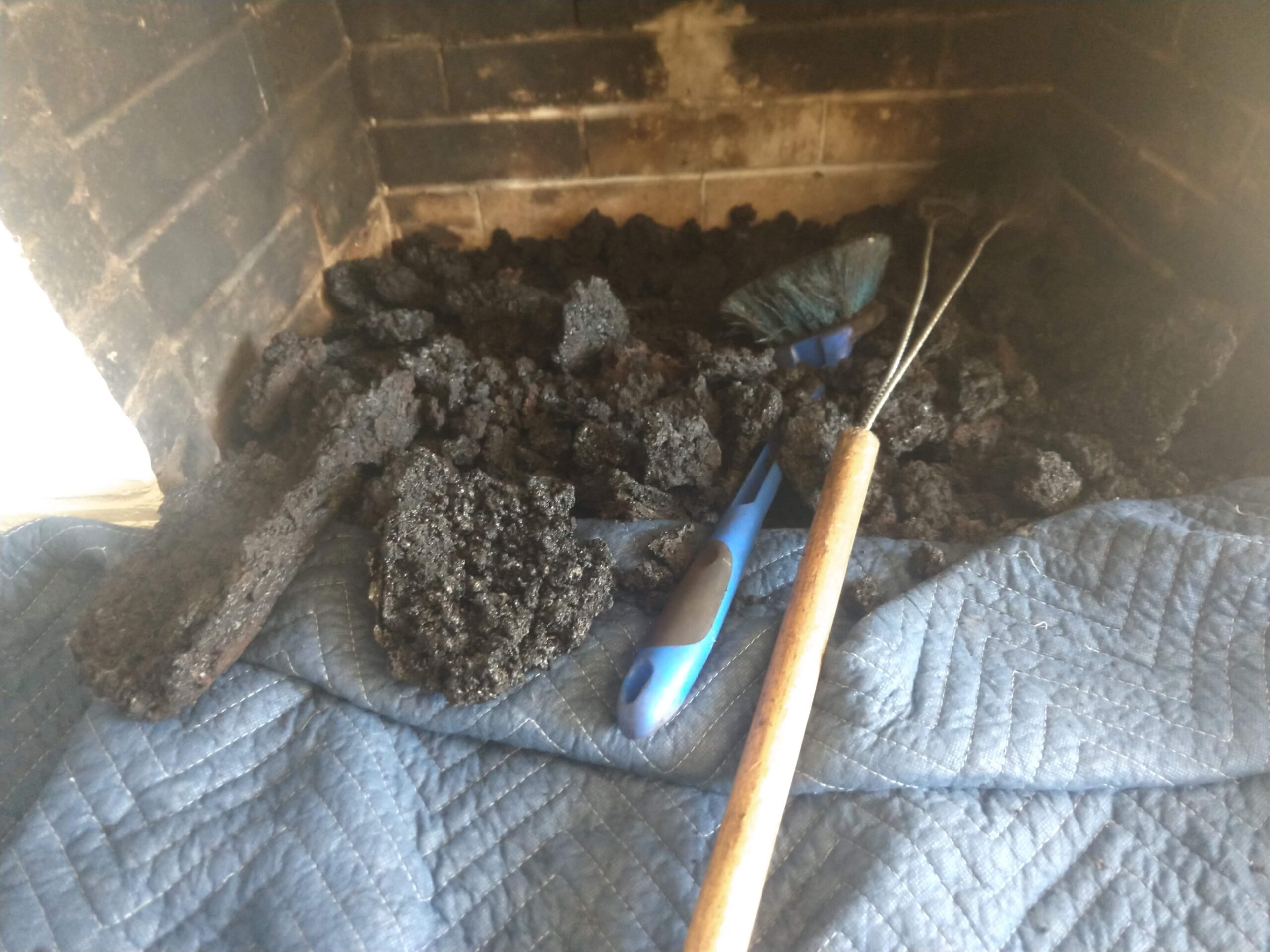 IMG_20181203_144456285 Charred creosote removed from a chimney during chimney cleaning process. Portland Oregon.