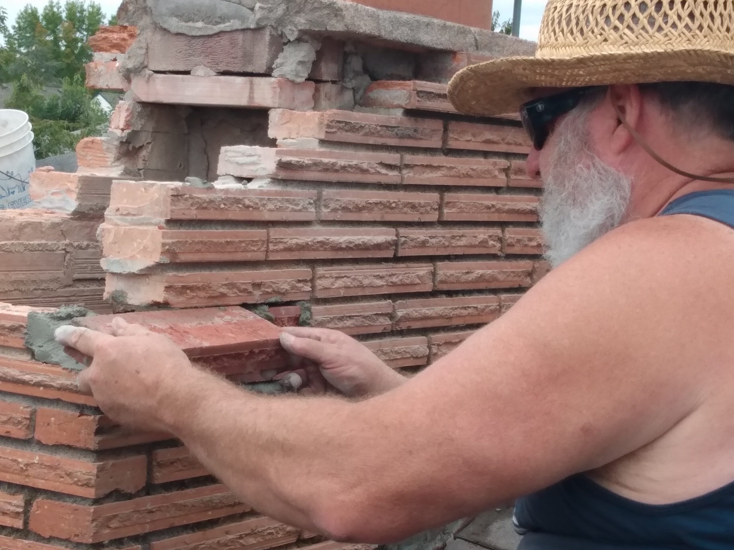Damaged brick replacement to a chimney. Portland Oregon.
